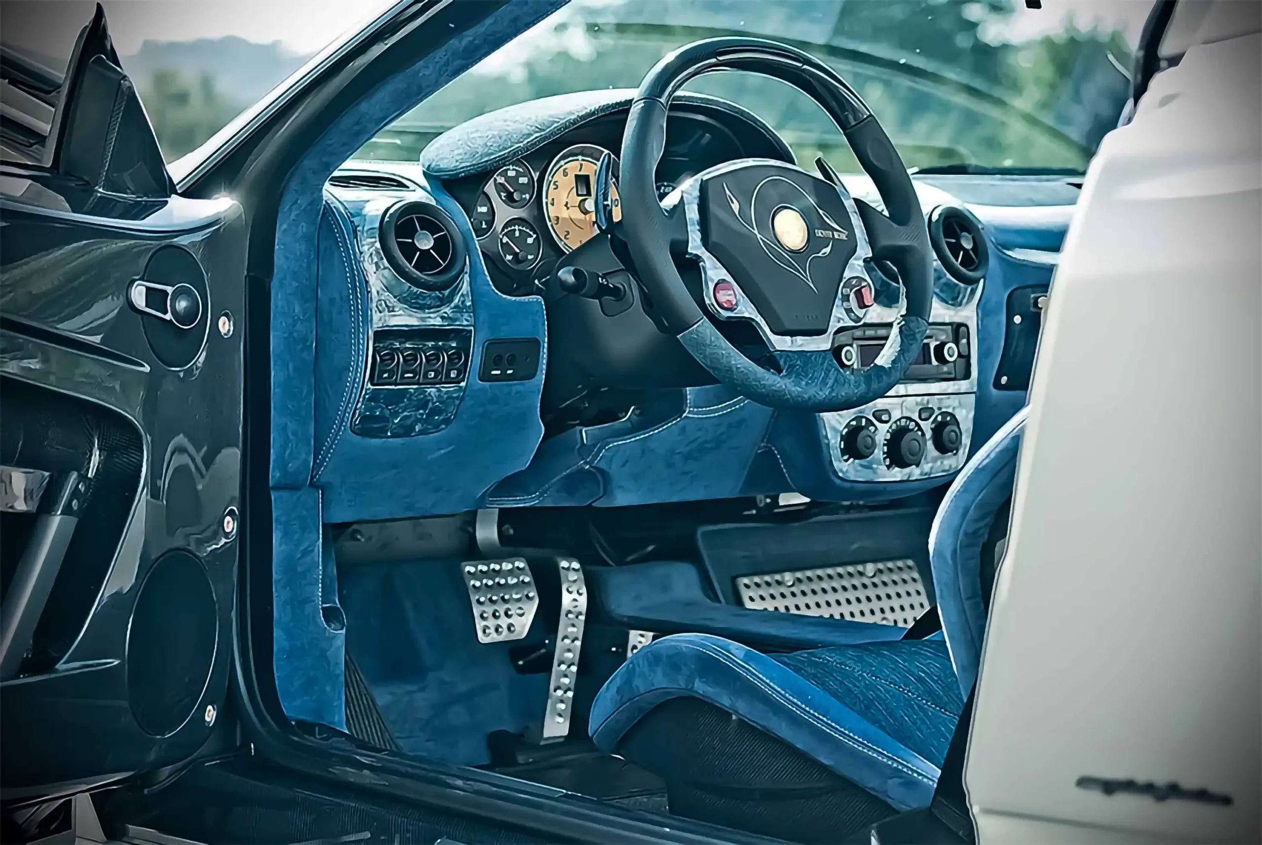 the dashboard of a car mother of pearl on ferrari car