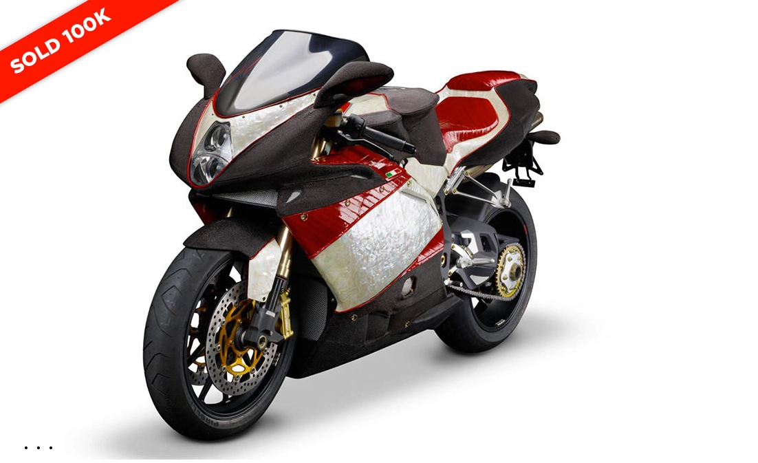 a red and black mother of pearl motorcycle